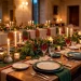 Luxe holiday table setting with layered linen fabrics, glowing candles, and festive greenery centerpiece.