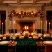Luxurious Thanksgiving dining table featuring a velvet runner, gold candles, and elegant harvest decor.