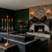 Sophisticated Halloween living room with layered textures of velvet, lace, and matte black decor.