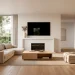 Minimalist living room with wall-mounted TV over a white mantle decorated with simple ceramic vase.