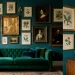 Eclectic vintage gallery wall with gold frames and brass accents above a green velvet sofa in a bright room.