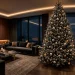 A dark charcoal Christmas tree with silver and gold ornaments in a moody modern living room setting.