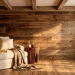 Breathtaking rustic wood reading nook with reclaimed wall and ceiling beams.
