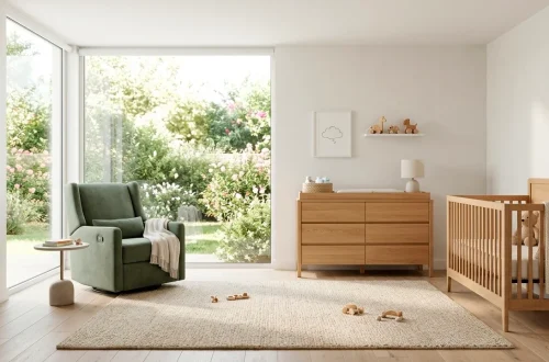 Modern minimalist nursery with space-saving convertible furniture and soft green accents in natural light.