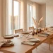 Wide 2:1 shot of a minimalist Japandi Thanksgiving table with natural wood, ceramics, and linen textures.