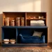 Upcycled vintage TV cabinet transformed into a trendy pet bed and feeding station in a modern living room.