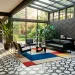 Modern sunroom interior featuring bold geometric patterns, hexagon tiles, and minimalist furniture bathed in bright sunlight.