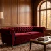Luxurious fall living room featuring a deep burgundy velvet sofa, warm brass accents, and rich autumn lighting.