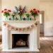 Wide view of a patriotically decorated white fireplace mantle with handmade Memorial Day crafts.