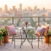 Wide view of a modern apartment balcony decorated with chic pastel furniture and soft textiles.