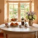 Cozy French country breakfast nook with distressed table and fresh flowers for Mother's Day morning.