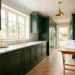 Luxurious forest green laundry room with brass accents and marble countertops.