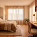 Beautifully lit home office and guest bedroom combination space with warm ambient lighting