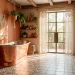 Wide view of a luxury boho bathroom with copper tub, geometric floor tiles, and lush greenery in sunlight.