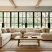 Cozy modern farmhouse living room with layered cream and beige textures and natural wood accents.