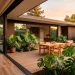 Seamless mid century modern patio with open sliding glass doors and teak furniture connecting to interior living room