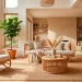 Modern living room featuring stylish natural rattan furniture and warm neutral tones