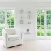 A small bright white sunroom with large windows and minimalist decor flooded with natural light.