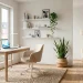 Bright and airy Scandi-chic home office with a white desk, warm wood accents, and natural light
