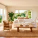 Bright summer living room featuring a large natural jute rug under a white linen sofa and woven rattan chairs.