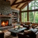 A rugged earthy living room featuring a massive stacked stone fireplace and cozy leather seating