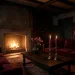 Moody dark cottagecore living room decorated for Valentine's Day with deep burgundy velvet and brass candelabras