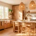 Wide view of a bright natural boho kitchen featuring stylish wicker stools and rattan lighting fixtures.