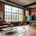 Industrial chic studio apartment featuring exposed brick walls, leather sofa, and large factory windows.
