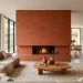 Large terracotta Venetian plaster fireplace in a contemporary living room with neutral furnishings