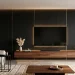Modern living room featuring a dramatic matte black TV wall with gold trim and a floating walnut media console.