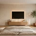 Serene bedroom with a sleek wall-mounted TV on a textured beige wall above a floating oak console with soft lighting.
