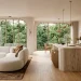 Luxurious open concept 2025 living room and kitchen renovation featuring curved bouclé sofa and fluted travertine island.