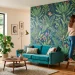 Modern living room with a partially applied beautiful botanical peel and stick wallpaper feature wall