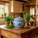 Large blue and white hand-painted porcelain pot on oak island in classic country kitchen