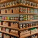 Beautifully organized modern home pantry showing neatly arranged canned goods and clear storage bins