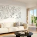 Large minimalist single-line art canvas above a modern boucle sofa in a sunlit living room.