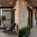 Modern industrial balcony featuring concrete walls and steel furniture