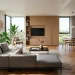 Wide panoramic view of a beautifully organized studio apartment featuring clever hidden storage solutions.
