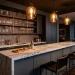 Luxurious modern home bar featuring charcoal grey cabinetry and a stunning white marble countertop.