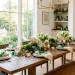 A modern dining room decorated with fresh St. Patrick's Day greenery and gold accents.