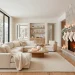 Sophisticated monochromatic Christmas decor in a modern living room with a flocked tree and white ornaments.