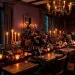 Moody Halloween dining table set with dark floral arrangements, candlelight, and velvet linens for a romantic gothic vibe.