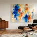Mid century modern living room featuring a vibrant contemporary abstract painting and a walnut credenza.