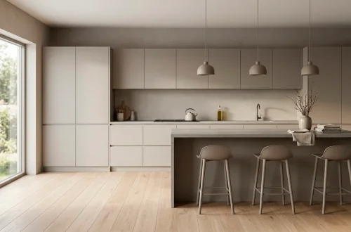 Minimalist Scandinavian kitchen featuring monochromatic grey tones, sleek cabinetry, and bright morning light.