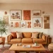 Sunlit living room showcasing a desert modern gallery wall with terracotta art and natural wood frames.