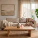 Minimalist Japandi style living room with subtle blush pink Valentine's Day decor on a low oak coffee table