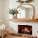 A wide 2x1 banner showing a beautifully styled serene Mother's Day mantel with a mirror and eucalyptus.