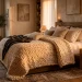 Wide horizontal view of a cozy bedroom featuring a massive cream chunky knit blanket draped over a luxurious bed.