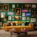 Maximalist living room featuring an emerald green gallery wall with mixed frames, neon art, and a yellow velvet sofa.