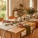 Beautifully styled organic modern tablescape with linen runner and matte ceramics